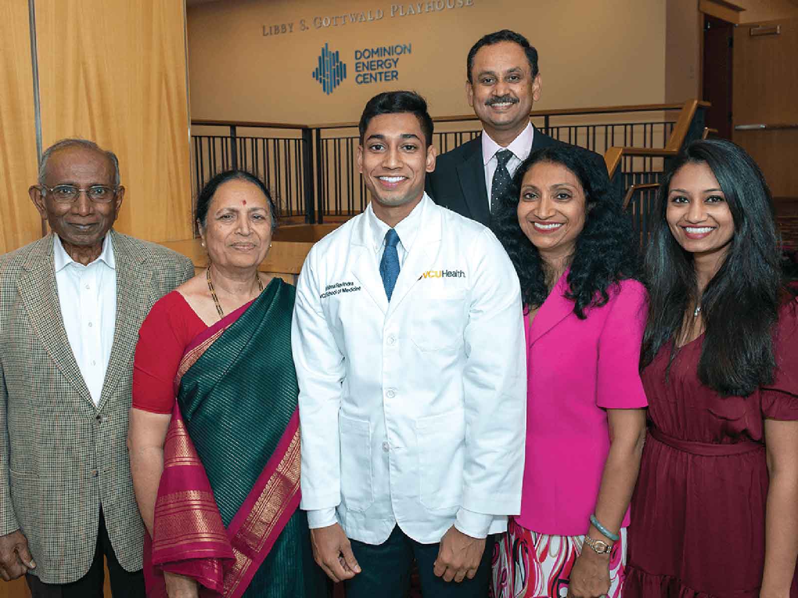 M.B. Veerabhadrappa (left), Shantha Veerabhadrappa, Krishna Ravindra, P.V. Ravindra, M.D., Geetha Ravindra and Lakshmi Ravindra, M.D., at the School of Medicine’s White Coat Ceremony in 2019