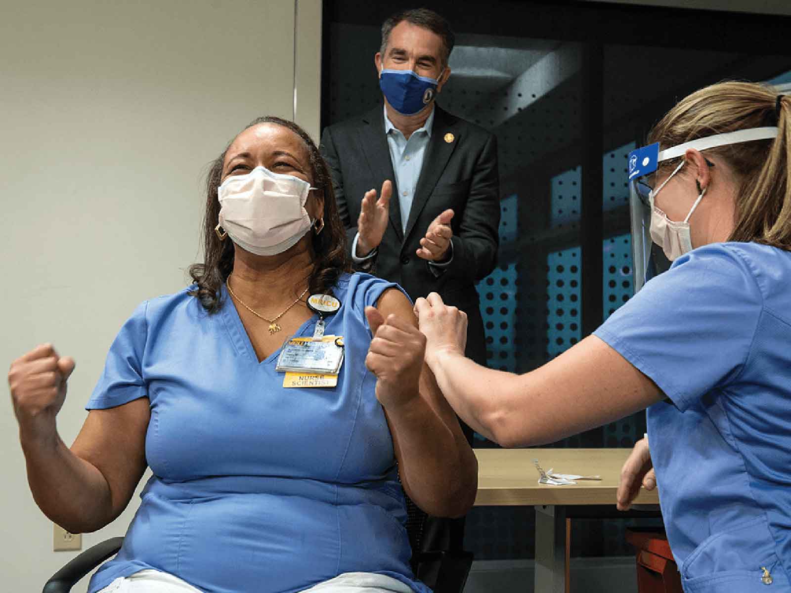 Virginia Gov. Ralph Northam and VCU Health team member Audrey Roberson, Ph.D., recipient of the first COVID-19 vaccine at VCU Health