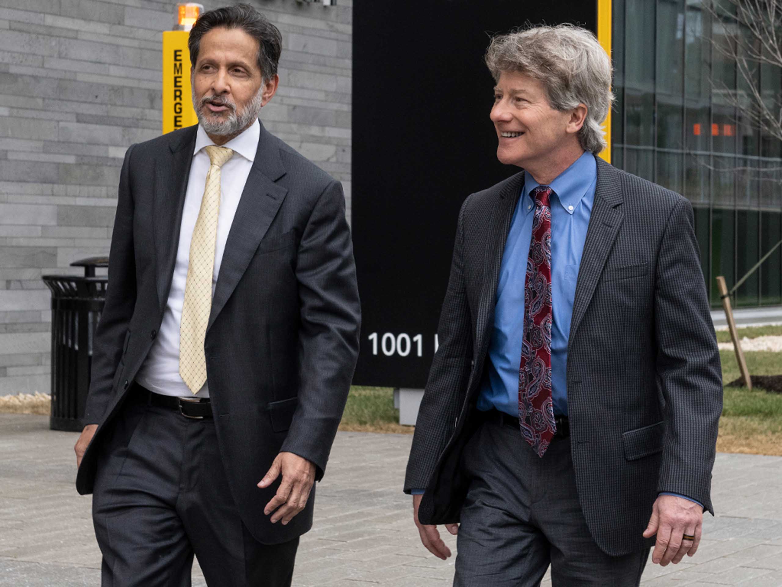 Arun Sanyal, M.D. and R. Todd Stravitz, M.D. walking outside