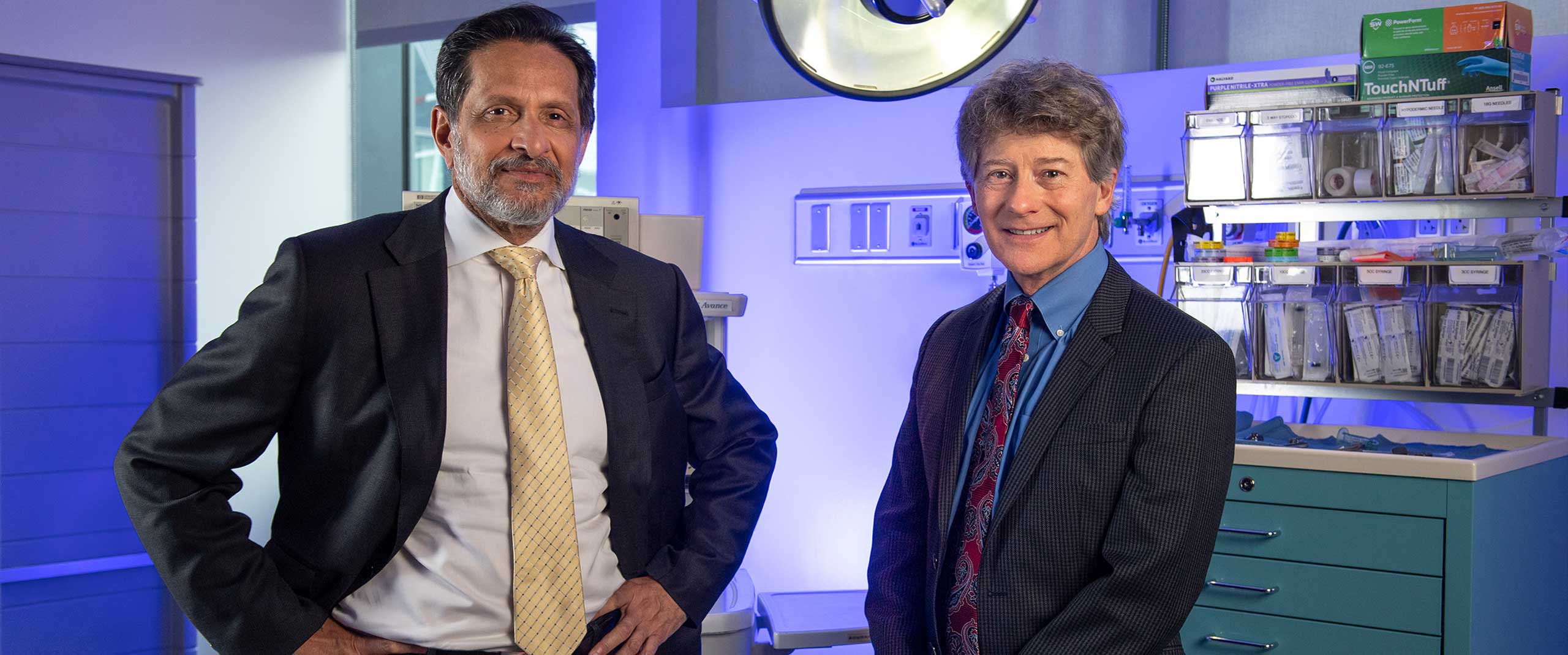 Arun Sanyal, M.D. and R. Todd Stravitz, M.D. standing in a lab room